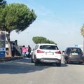 Incidente in via Olivetti: scontro fra due auto, una si capovolge