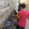 Clean up di alcuni volontari nei pressi della Basilica della Madonna dei Martiri