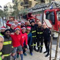 I Babbi Natale del gruppo SUS dei Vigili del Fuoco per le vie di Molfetta