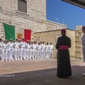 Monsignor Martella in visita alla Capitaneria di porto