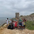 Rispettare l'ambiente: i più piccoli puliscono l'oasi naturale di Torre Calderina