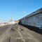 Crepe e innalzamenti dell'asfalto al molo del porto di Molfetta